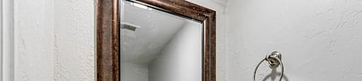 A bathroom sink with a mirror above it.
