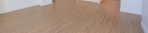 A kitchen area with a counter and cabinets.