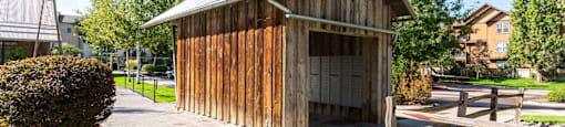 A wooden structure housing apartment mailboxes at Mullan Reserve Apartments in Missoula, MT