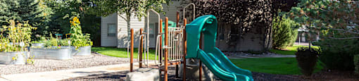 Playground with slide at Mullan Reserve Apartments in Missoula, MT