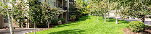A grassy area next to the apartments at Mullan Reserve Apartments in Missoula, MT