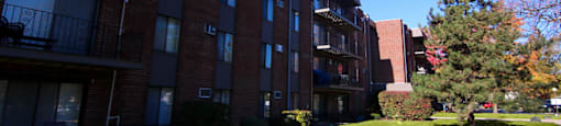 Brick Apartment Building and Landscape at Lansing Riverwood, LLC, Lansing