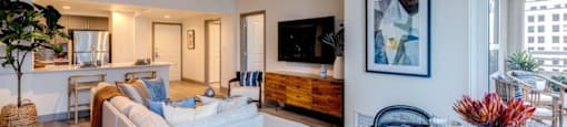 a living room with a couch and a table