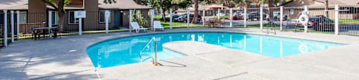 Arbropointe Apartments Pool with Lounge Chairs
