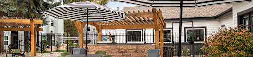 Ironwood at the Ranch Apartments Outdoor Table Seating by Pool