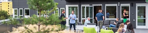 Neighbors enjoying a resident event outdoors