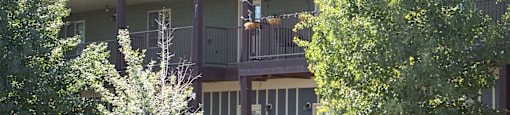 a house with two trees in front of it at King West One, Montana, 59106