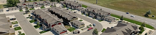 an aerial view of a neighborhood of houses in a suburban neighborhood at King West One, Billings, MT