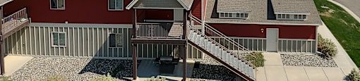 an aerial view of a neighborhood of houses with roofs at King West One, Billings, Montana