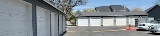 a parking lot in front of a garage