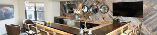 European-Style Kitchen With Breakfast Bar at Avenue C Apartments, Billings, Montana