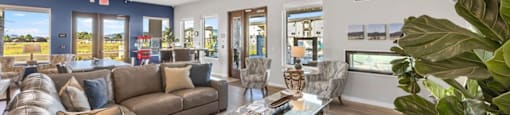 a living room with couches and a coffee table