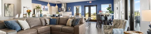 a living room with a couch and a table