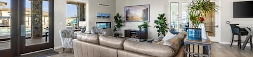 a living room with a couch and a tv