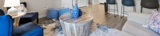 a living room with a couch and a table