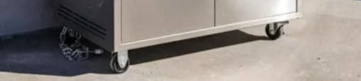 a stainless steel grill on a patio