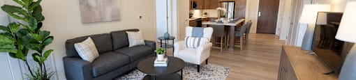 a living room with a couch and a table