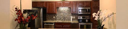 Modern Community Room Kitchen at Highlands at Riverwalk Apartments 55+, Wisconsin 53092