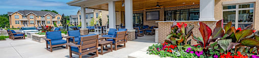 the reserve at city center spacious covered patio with chairs and flowers