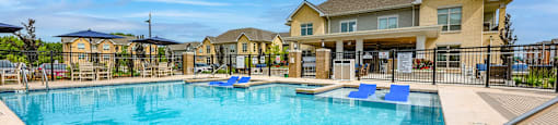 the swimming pool at the preserve at polo ridge apartments