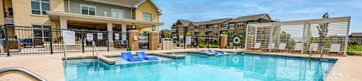 our apartments have a large resort style pool with lounge chairs