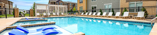 our apartments have a resort style pool with lounge chairs