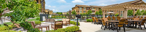 the preserve at ballantyne commons courtyard with tables and chairs