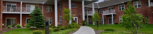 Lush landscaping With Walking Trails at Highlands at Riverwalk Apartments 55+, Mequon, WI,53092