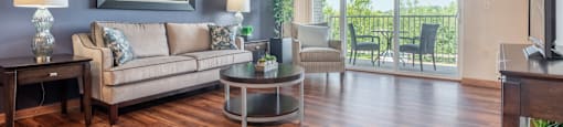 a living room with a couch and a table