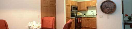 Separate Dining Area With Modern Lighting at Highlands at Riverwalk Apartments 55+, 10954 N Cedarburg Road, Mequon, WI 53092