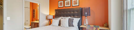 guest bedroom with desk next to bed