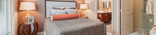 carpeted bedroom with large closet