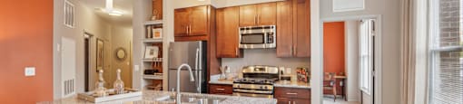 a kitchen with a granite counter top and a sink