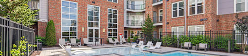 our apartments at the district feature a swimming pool and outdoor furniture