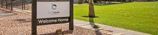 a building with a sign that says welcome home