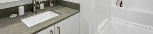 a bathroom with a sink and a shower and a mirror