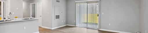 Apartments for Rent Fredericksburg, VA - England Run North - Large Empty Living Room with Sliding Glass Door to Patio
