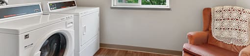 Laundry room at Lakewood Meadows in Lakewood, WA