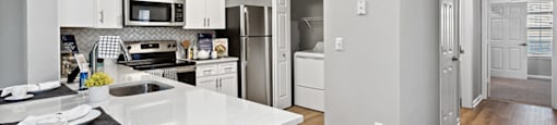 Renovated Kitchen with Kitchen Island at England Run Apartments in Fredericksburg VA