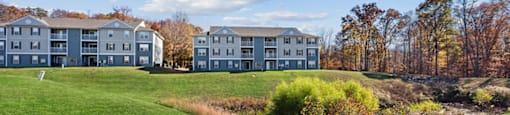 Exterior and lawn 2 at England Run Apartments in Fredericksburg VA