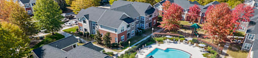 Aerial view of pool and landscaping at Grand Oaks Apartments in Chester VA