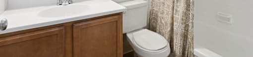 Bathroom with sink and toilet at Villages at Marley Station in Glen Burnie MD
