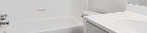 Bathroom with white vanity at Oakfield Apartment Homes in Wheaton MD