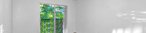 Bedroom with ceiling fan at Cedar Grove Apartments in Miami Gardens FL