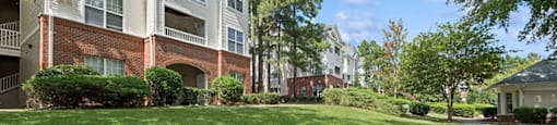 Building exterior at Falls Pointe at the Park Apartments in Durham NC