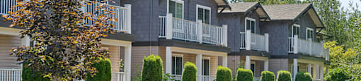 Building exteriors at Woodlands at Forbes Lake Apartments in Kirkland WA