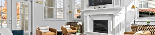 Clubroom with seating area at Grand Oaks Apartments in Chester VA