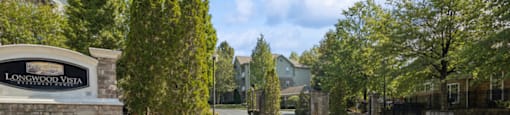 Community entrance monument at Longwood Vista Apartment Homes in Atlanta GA