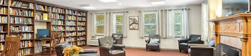 Community social lounge and library at Fairbrooke Senior Apartments in Aberdeen MD