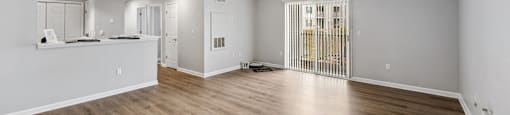 Apartment with private patio and hardwood flooring at England Run Apartments in Fredericksburg VA